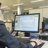 La Poste veut créer 200 emplois supplémentaires sur son site informatique de Lisbonne (photo d'archives). KEYSTONE/CHRISTIAN BEUTLER