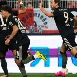 Harry Kane jubile après l'égalisation à 2-2 KEYSTONE/AP/Martin Meissner