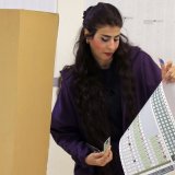 Plus de 21,4 millions d'électeurs sont appelés à départager plus de 7700 candidats, dont près d'un tiers de femmes, pour occuper 329 sièges de députés. KEYSTONE/EPA/CEERWAN AZIZ