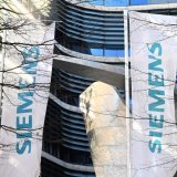 Le conglomérat industriel allemand Siemens a fait état d'un bénéfice net record pour la troisième année d'affilée. (archive) KEYSTONE/DPA/FELIX HÖRHAGER