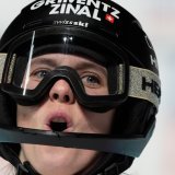 Camille Rast heureuse de son podium KEYSTONE/AP/Giovanni Auletta
