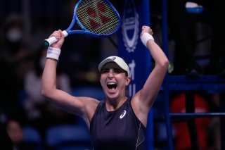 Belinda Bencic laisse éclater sa joie après avoir remporté le titre à Tokyo KEYSTONE/AP/Louise Delmotte