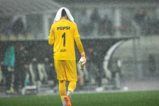 La pluie a rendu la pelouse du Cornaredo impraticable KEYSTONE/MASSIMO PICCOLI