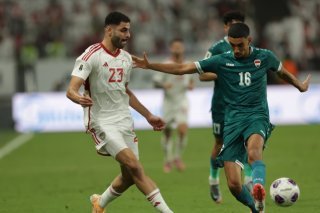 Amir Al-Ammari (à droite) a inscrit un but décisif pour l'Irak mardi KEYSTONE/EPA/ALI HAIDER