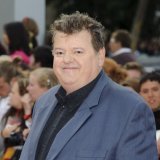 Né en Ecosse, l'acteur était adoré des enfants du monde entier pour son interprétation du gentil, maladroit demi-géant à la barbe très fournie (archives).