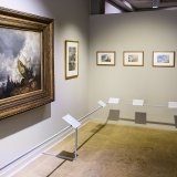 Une personne regarde une peinture de l'artiste William Turner "La Chute d'une avalanche dans les Grisons" lors de l'exposition "The Sun is God" en collaboration avec la Tate de Londres, à la Fondation Gianadda à Martigny.
