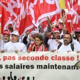 Des ouvriers du second oeuvre du syndicat Unia ont défilé lundi à Lausanne lors de la manifestation du 1er Mai.